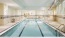 a swimming pool in a large room